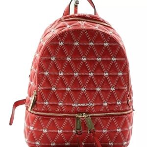 Michael Kors Woman’s Red backpack with matching wallet